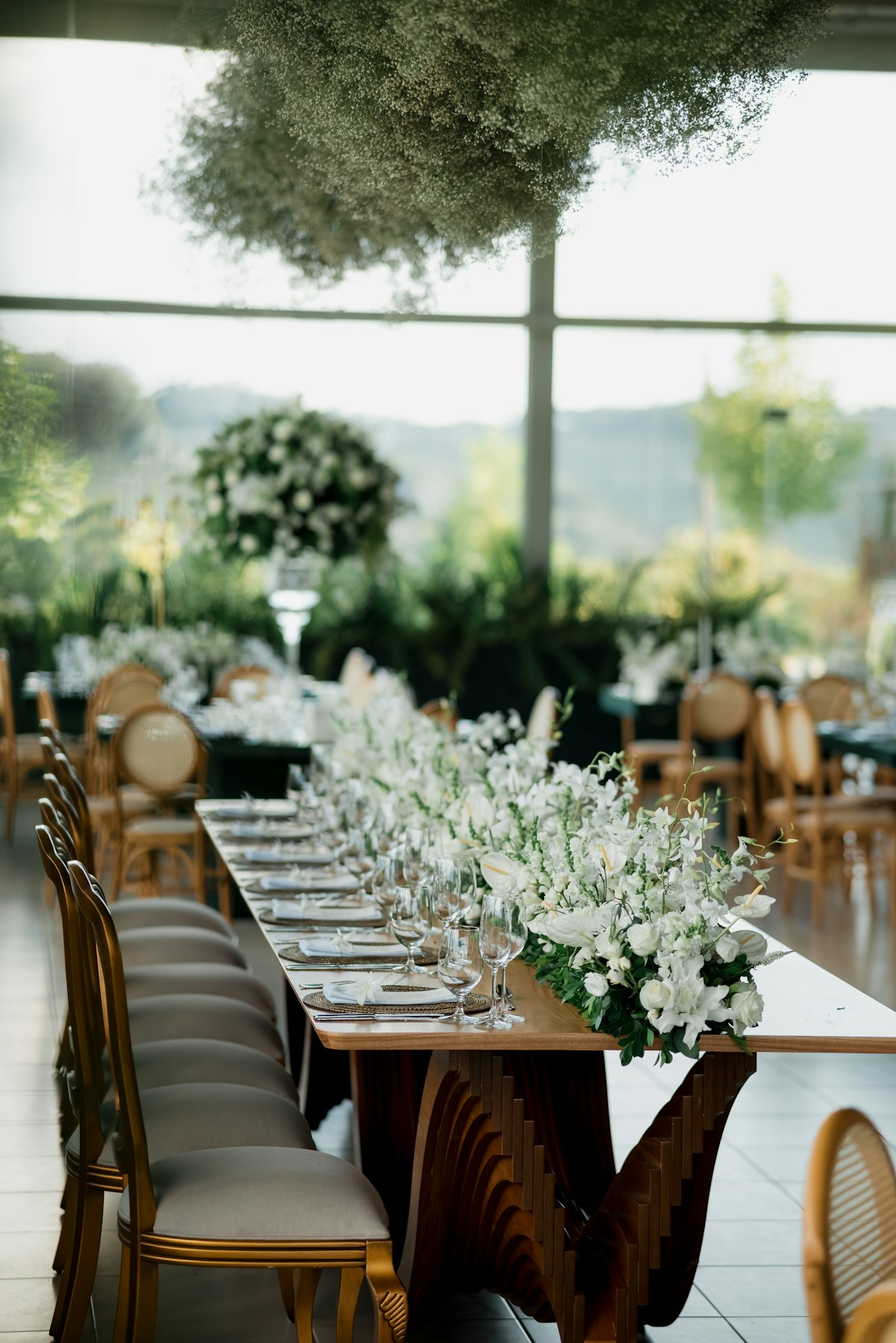 Luxury wedding design with elaborate floral centerpieces and elegant table styling